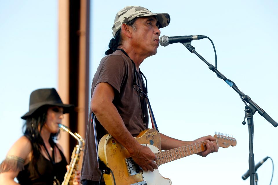 Ben Han performs with the Red Dirt Rangers during the Woody Guthrie Folk Festival in Okemah, Okla., Thursday, July 12, 2018.