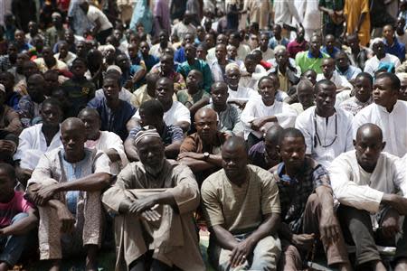 Men attend Friday prayers at the Grand Mosque in Bamako February 21, 2014. REUTERS/Joe Penney