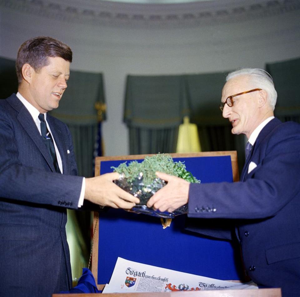 President John F. Kennedy accepts shamrocks from the Ambassador of Ireland, Thomas J. Kiernan, in 1961. Cecil Stoughton. White House Photographs. John F. Kennedy Presidential Library and Museum, Boston
