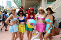 <p>Cosplayers dressed as Disney summer princesses at Comic-Con International on July 20 in San Diego. (Photo: Angela Kim/Yahoo Entertainment) </p>