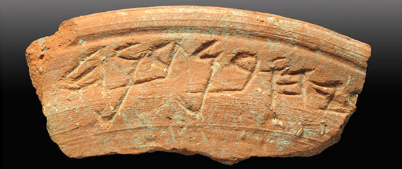 A ceramic bowl shard with a 2,700-year-old inscription. The bowl was found during an archaeological excavation in the City of David, an ancient neighborhood in Jerusalem.