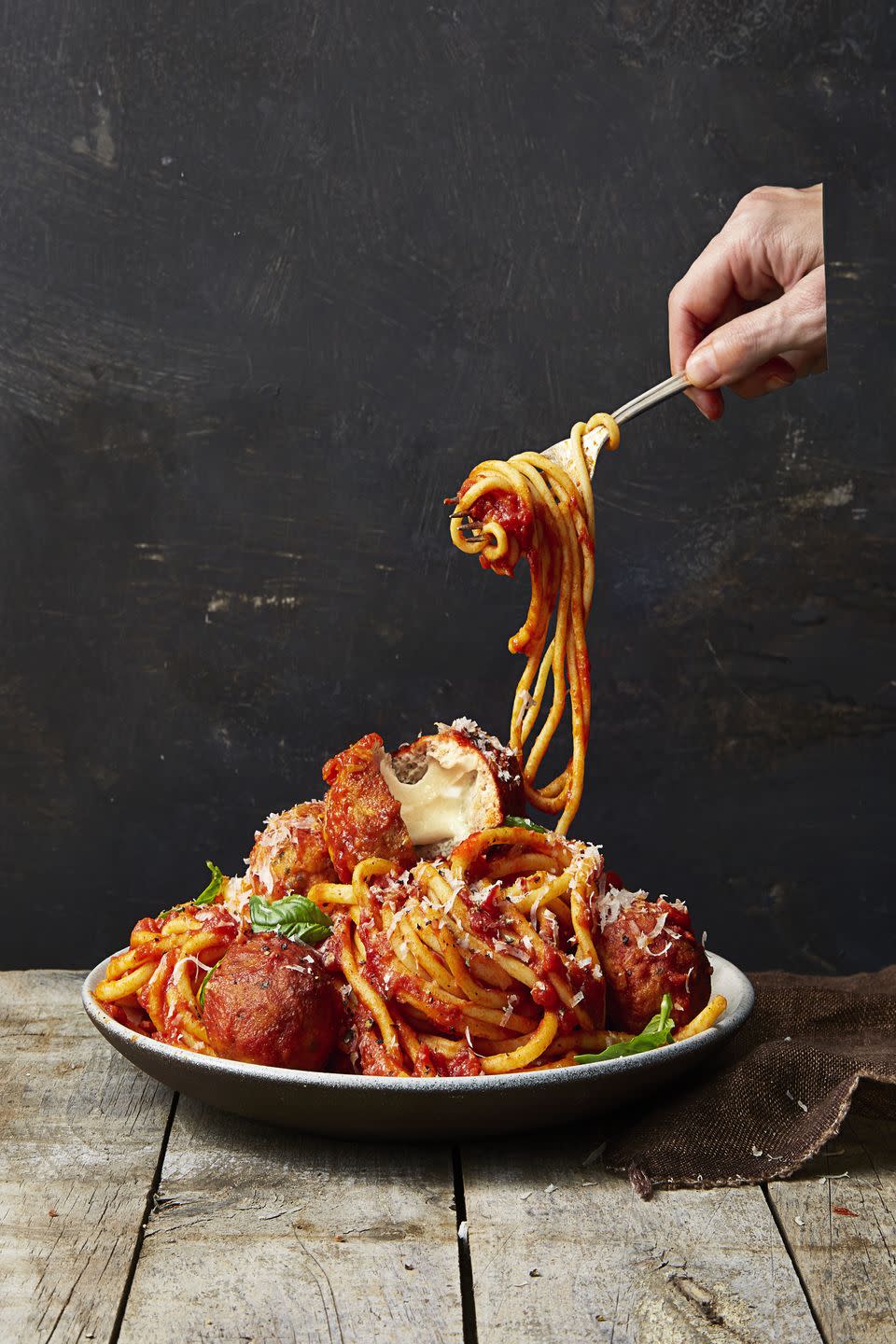 <p>We used lean turkey instead of beef so we could stuff these babies with cheese. It's all about the balance.</p><p><em><a href="https://www.goodhousekeeping.com/food-recipes/easy/a36631/mozzarella-stuffed-turkey-meatballs/" rel="nofollow noopener" target="_blank" data-ylk="slk:Get the recipe for Mozzarella-Stuffed Turkey Meatballs »;elm:context_link;itc:0;sec:content-canvas" class="link "><span class="redactor-invisible-space">Get the recipe for Mozzarella-Stuffed Turkey Meatballs »</span> </a></em></p>