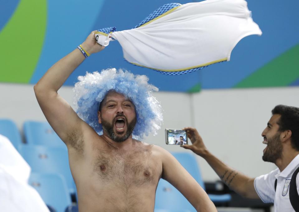 <p>Fans wave their jerseys and celebrate after Argentina defeated Brazil in a men’s basketball game at the 2016 Summer Olympics in Rio de Janeiro, Brazil, Saturday, Aug. 13, 2016. (AP Photo/Eric Gay) </p>