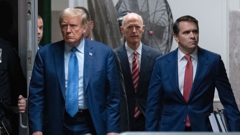 Former President Donald Trump arrives with attorney Todd Blanche and Sen. Rick Scott for his trial for allegedly covering up hush money payments at Manhattan Criminal Court on May 9, in New York City. - Jeenah Moon/Pool/Getty Images