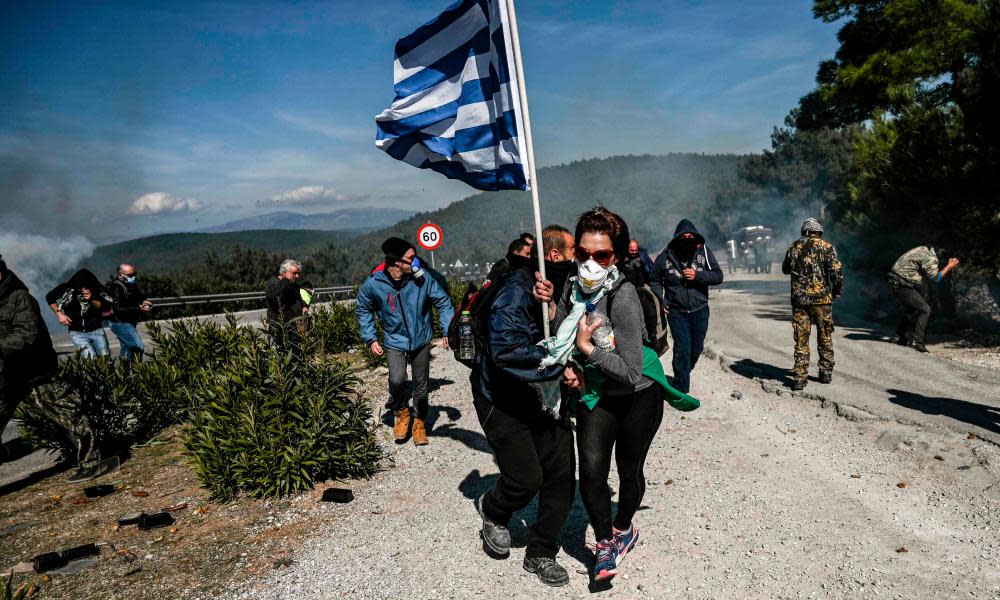 <span>Photograph: Aris Messinis/AFP via Getty Images</span>