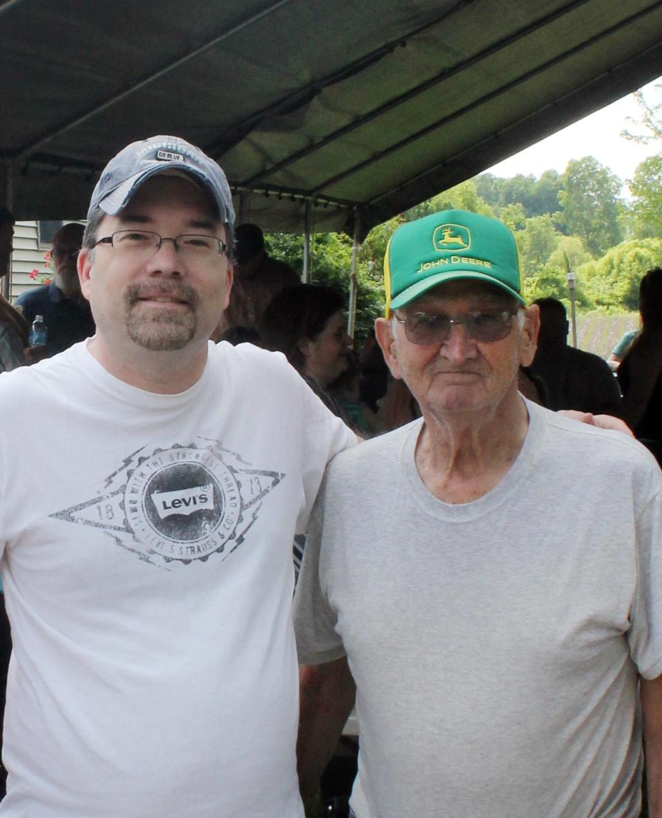 Daily Telegram history columnist Dan Cherry, left, is pictured with Pete Poling at a Poling family and friend celebration in 2014.