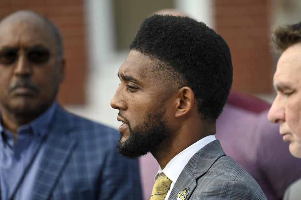 Baltimore Mayor Brandon Scott, center, speaks at a press conference after an officer involved shooting in the Shipley Hill neighborhood of Baltimore, Thursday afternoon, May 11, 2023. (Jerry Jackson/The Baltimore Sun via AP)