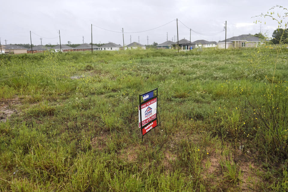 A for sale is shown on a vacant lot in the Santa Fe subdivision of the Colony Ridge development Tuesday, Oct. 3, 2023, in Cleveland, Texas. For weeks in Texas, conservative media and GOP activists have been pushing unsubstantiated claims that Colony Ridge has become a magnet for immigrants living in the U.S. illegally and that cartels control pockets of the neighborhood.(AP Photo/David J. Phillip)