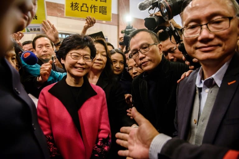 Some pro-establishment lawmakers in Hong Kong have told how they have come under direct pressure to vote in favour of former deputy leader Carrie Lam (pictured, L)