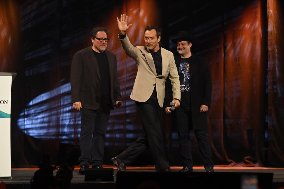 (L-R) Jon Favreau, Jude Law and Dave Filoni