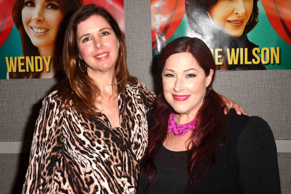 <p>Albert L. Ortega/Getty </p> Wendy Wilson and Carnie Wilson attend The Hollywood Show held at Los Angeles Marriott Burbank Airport on July 1, 2023 in Burbank, California.