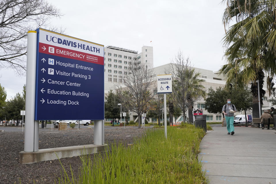 The University of California, Davis Medical center is seen in Sacramento, Calif., Friday, Dec. 11, 2020. The medical center is one of more than a half-dozen California health centers that are expected to receive the 327,000 doses of Pfizer's COVID-19 vaccine soon after it is approved by the U.S. Food and Drug Administration. (AP Photo/Rich Pedroncelli)