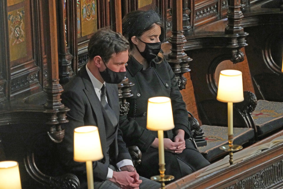 Princess Eugenie of York and Jack Brooksbank pictured in the pews. 