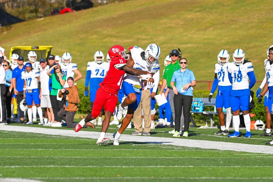 University of West Florida wide receiver John Jiles (0) makes a catch along the sideline during the Argos' 10-6 loss at the University of West Alabama on Saturday, Oct. 14, 2023, in Livingston, Alabama.