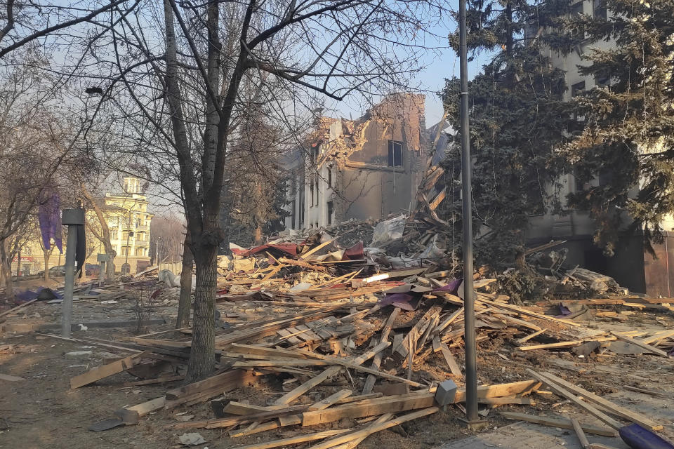 Rubble covers where the field kitchen stood outside of the Donetsk Academic Regional Drama Theatre on March 17, 2022, in Mariupol, Ukraine. The March 16, 2022, bombing of the theater stands out as the single deadliest known attack against civilians to date in the Ukraine war. (Lev Sandalov via AP)