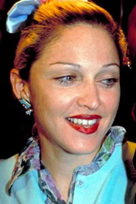 Over-plucked Brows: Madonna in 1992.