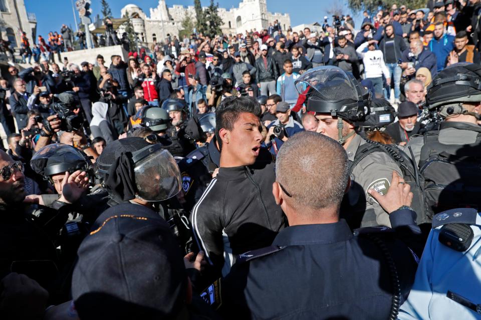 <p>Israeli forces scuffle with Palestinians at Damascus Gate in Jerusalem’s Old City on Dec. 8, 2017. (Photo: Thomas Coex/AFP/Getty Images) </p>