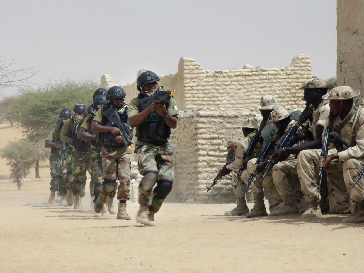 In this March 7, 2015 file photo, Nigerian special forces and Chadian troops participate with US advisors in a military exercise: AP Photo/Jerome Delay, file