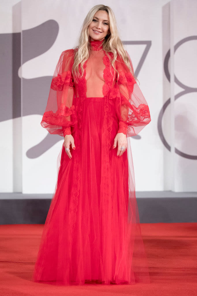Kate Hudson attends the red carpet of the movie "Mona Lisa And The Blood Moon" in a sheer red gown