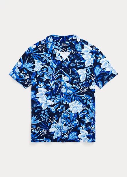 <p><a href="https://go.redirectingat.com?id=74968X1596630&url=https%3A%2F%2Fwww.ralphlauren.com%2Fmen-clothing-button-down-shirts%2Fcustom-slim-fit-floral-terry-camp-shirt%2F0076795855.html%3Fgad_source%3D1%26gclid%3DCjwKCAjwoPOwBhAeEiwAJuXRh-OgDVKakVmz3ULn0AdJF5UjXVPIMCs8JFwk14b-QOIBLxWCv9mbvhoCsxIQAvD_BwE%26gclsrc%3Daw.ds&sref=https%3A%2F%2Fwww.redbookmag.com%2Ffashion%2Ftrends%2Fg60962347%2Faloha-shirts-men%2F" rel="nofollow noopener" target="_blank" data-ylk="slk:Shop Now;elm:context_link;itc:0;sec:content-canvas" class="link ">Shop Now</a></p><p>Floral Terry Camp Shirt</p><p>ralphlauren.com</p><p>$99.99</p>