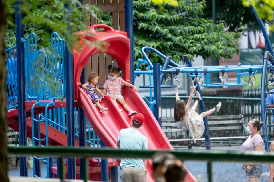 Aug. 1: Children with and without masks at a playground on New York City’s Upper West Side. (Getty Images)