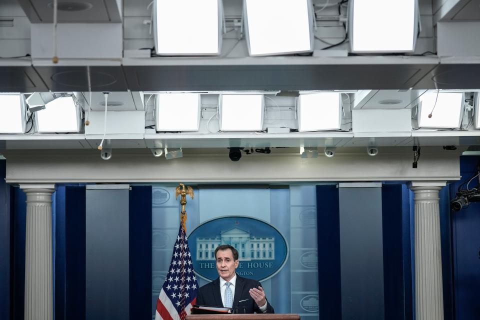 White House National Security Council  strategic communication coordinator John Kirby speaking from the briefing room on 13 February (Getty Images)