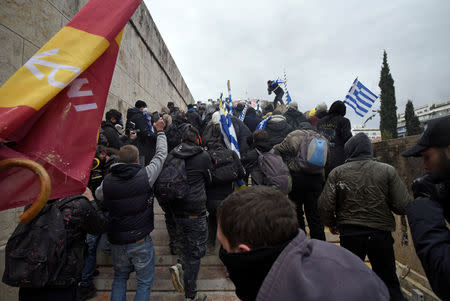 Protesters clash with police officers during a demonstration against the agreement reached by Greece and Macedonia to resolve a dispute over the former Yugoslav republic's name, in Athens, Greece, January 20, 2019. REUTERS/Alexandros Avramidis