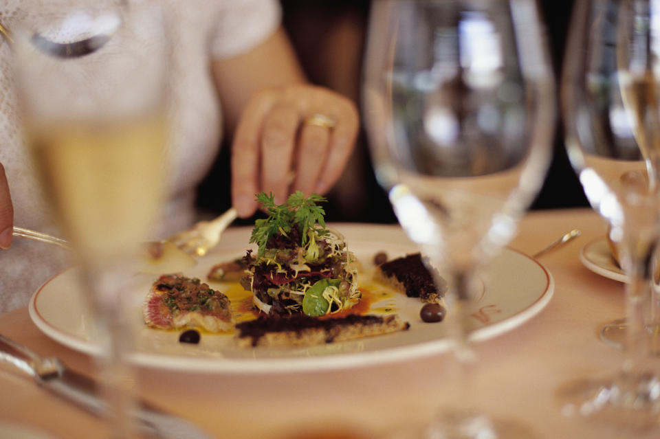 A person eating at a restaurant