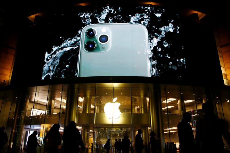 FILE PHOTO: Screen displaying an advertisement for iPhone 11 Pro is seen outside an Apple store in Beijing