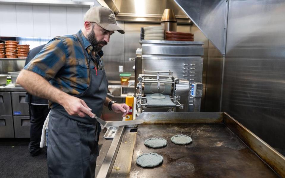 Cantina Pedregal co-owner Patricio Wise prepares sopes for a soft opening in the new restaurant on Tuesday in Folsom. Wise said that the masa is made fresh at the restaurant daily for tortillas, tetelas and tostadas.