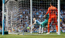 Soccer Football - Premier League - Manchester City v Tottenham Hotspur - Etihad Stadium, Manchester, Britain - April 20, 2019 Manchester City's Phil Foden scores their first goal REUTERS/Phil Noble