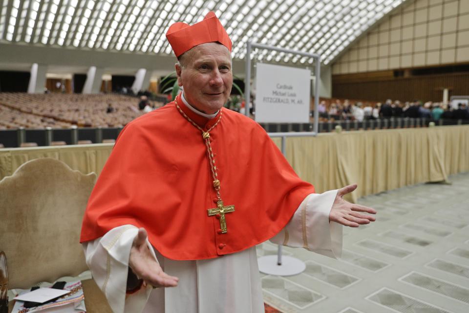 Cardinal Michael Louis Fitzgerald poses for photographers prior to meeting relatives and friends after he was elevated to cardinal by Pope Francis, at the Vatican, Saturday, Oct. 5, 2019. Pope Francis has chosen 13 men he admires and whose sympathies align with his to become the Catholic Church's newest cardinals. (AP Photo/Andrew Medichini)