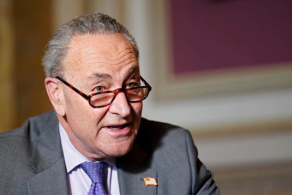 Senate Minority Leader Sen. Chuck Schumer of N.Y., speaks to reporters on Capitol Hill in Washington, Wednesday, Dec. 30, 2020, before his meeting with Transportation Secretary-designate Pete Buttigieg.