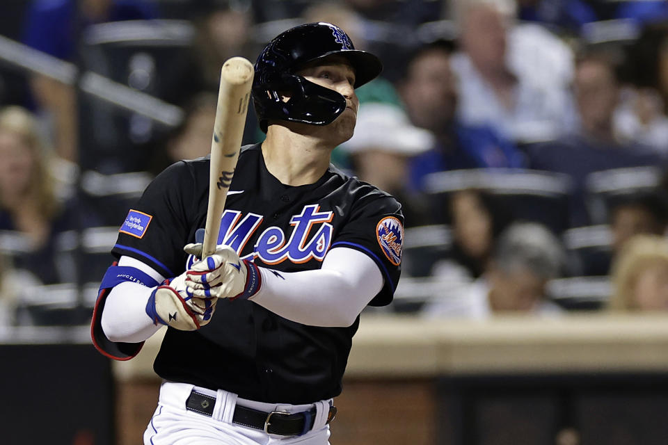 New York Mets' Brandon Nimmo watches his home run against the Seattle Mariners during the sixth inning of a baseball game Friday, Sept. 1, 2023, in New York. (AP Photo/Adam Hunger)