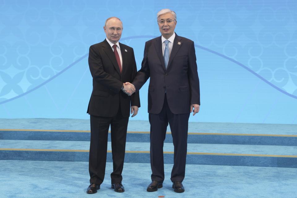 Kazakh President Kassym-Jomart Tokayev, right, and Russian President Vladimir Putin pose for a photo at the Shanghai Cooperation Organization (SCO) states leaders' summit in Astana, Kazakhstan, Thursday, July 4, 2024. (Gavriil Grigorov, Sputnik, Kremlin Pool Photo via AP)