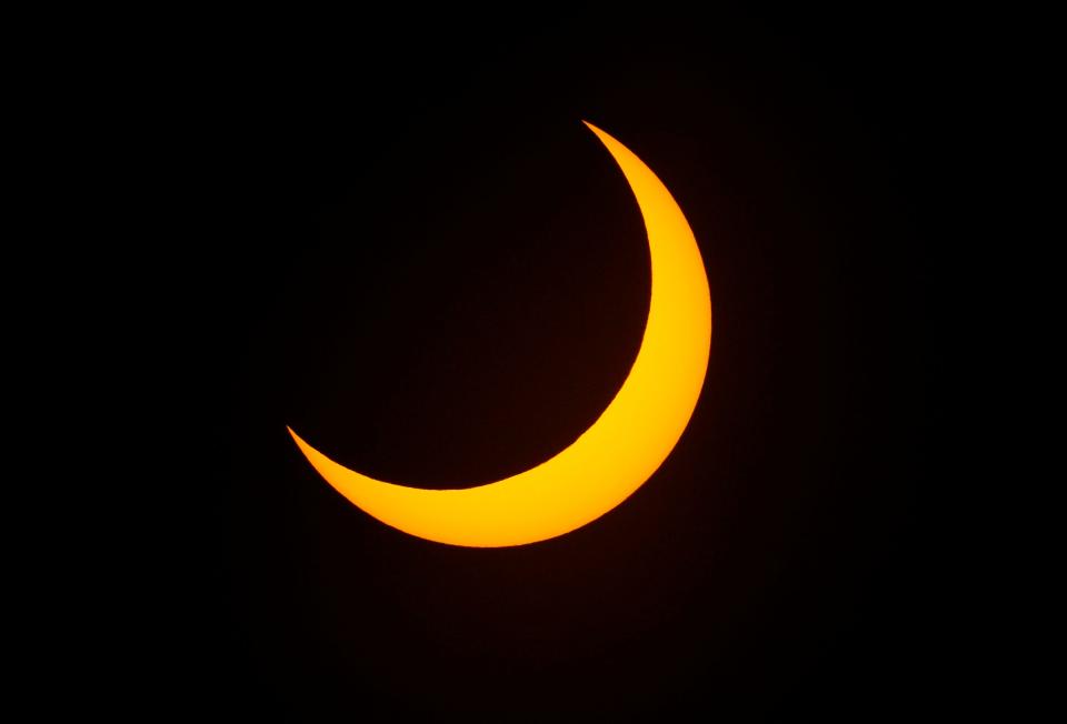 A solar eclipse is underway and is visible in the Southwestern and Northwestern United States on Saturday, Oct. 14, 2023.