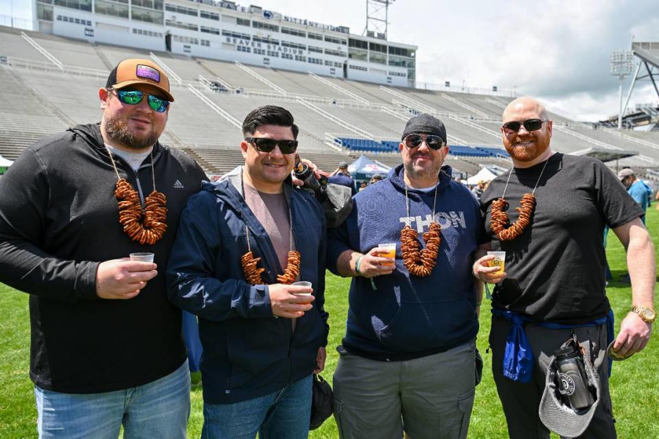 Friends pose together early on at the Hoppy Valley Brewers Fest on Saturday at Penn State’s Beaver Stadium. Jeff Shomo/For the CDT