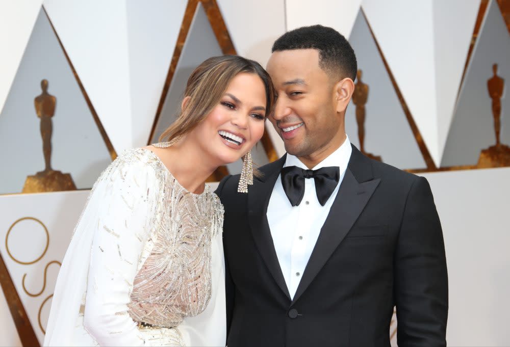 Chrissy Teigen has been driving around Los Angeles roasting John Legend for losing an Oscar