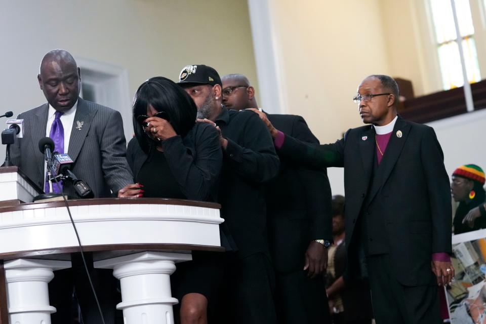 RowVaughn Wells, second from left, mother of Tyre Nichols, cries as she is comforted by Tyre's stepfather Rodney Wells, behind her, at a news conference with civil rights Attorney Ben Crump, left, in Memphis, Tenn., Monday, Jan. 23, 2023. Far right is Bishop Henry Williamson.