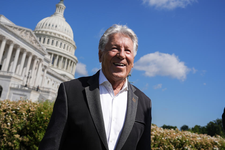 Formula One racing legend Mario Andretti talks to fans following a news conference at the Capitol in Washington, Tuesday, April 30, 2024. (AP Photo/J. Scott Applewhite)
