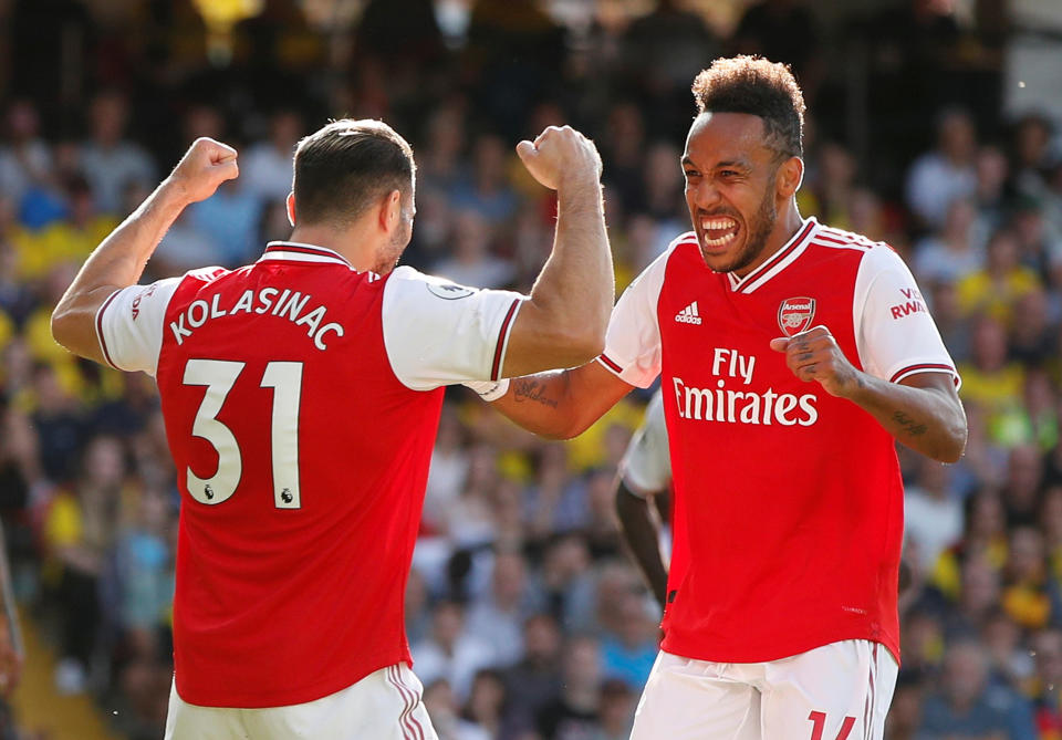 Soccer Football - Premier League - Watford v Arsenal - Vicarage Road, Watford, Britain - September 15, 2019  Arsenal's Pierre-Emerick Aubameyang celebrates scoring their first goal with Sead Kolasinac  Action Images via Reuters/John Sibley  EDITORIAL USE ONLY. No use with unauthorized audio, video, data, fixture lists, club/league logos or "live" services. Online in-match use limited to 75 images, no video emulation. No use in betting, games or single club/league/player publications.  Please contact your account representative for further details.