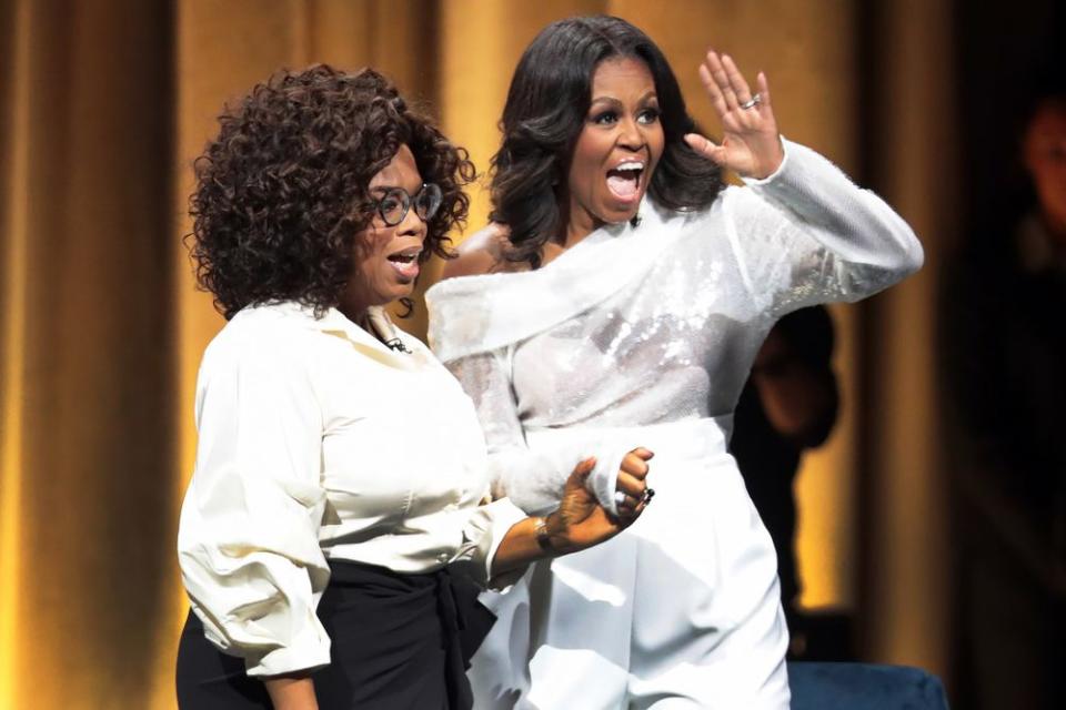 Oprah Winfrey (left) with Michelle Obama