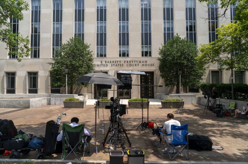 News outlets set up outside the E. Barrett Prettyman Federal Courthouse in Washington on Wednesday ahead of Donald Trump's arraignment on Thursday. Photo by Bonnie Cash/UPI