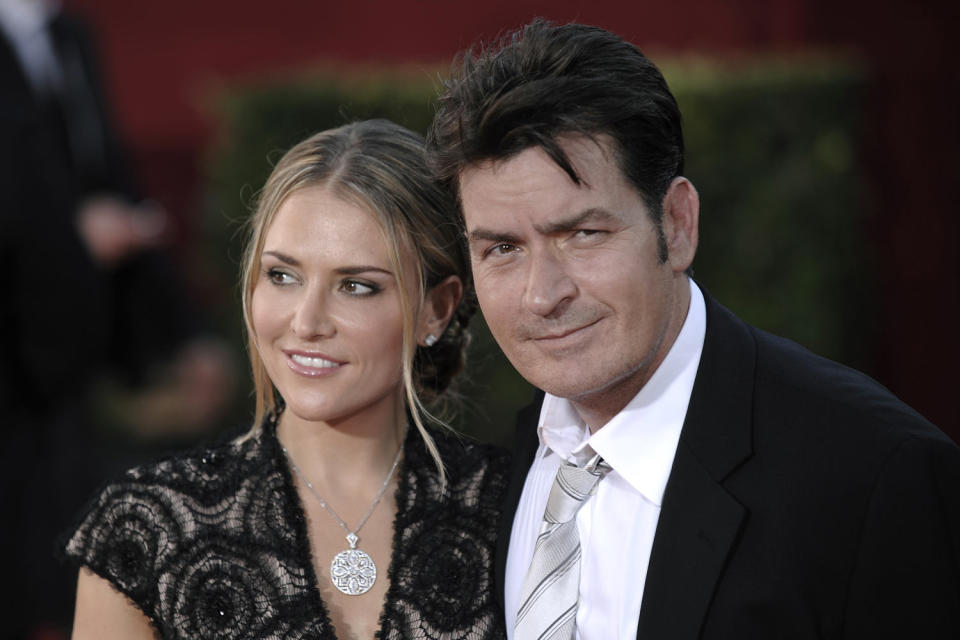 Charlie Sheen and then-wife Brooke Mueller arrive at the Emmy Awards in 2009. (Chris Pizzello / AP file)