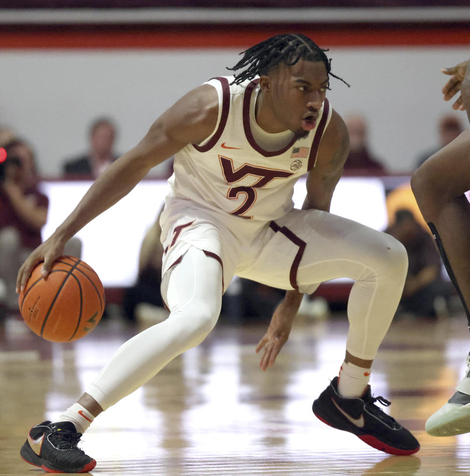 Virginia Tech's MJ Collins (2) dribbles the ball the first half of the the team's NCAA college basketball game against Florida State on Tuesday, Feb. 13, 2024, in Blacksburg, Va. (Matt Gentry/The Roanoke Times via AP)