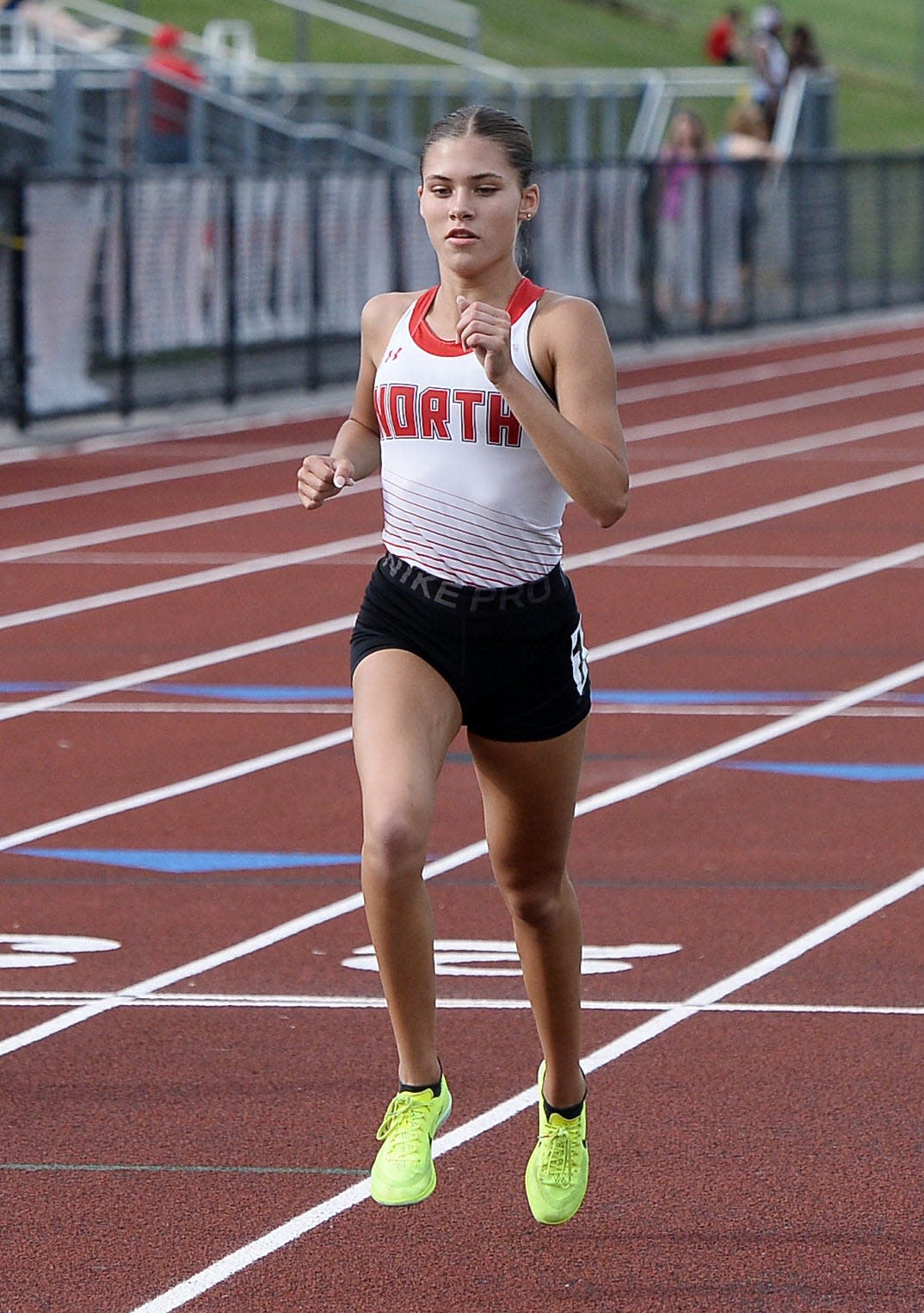 North Hagerstown's Lauren Stine leads the girls 1,600-meter run during the Washington County Track & Field Championships. Stine won the race in a personal-best time of 5:03.60.