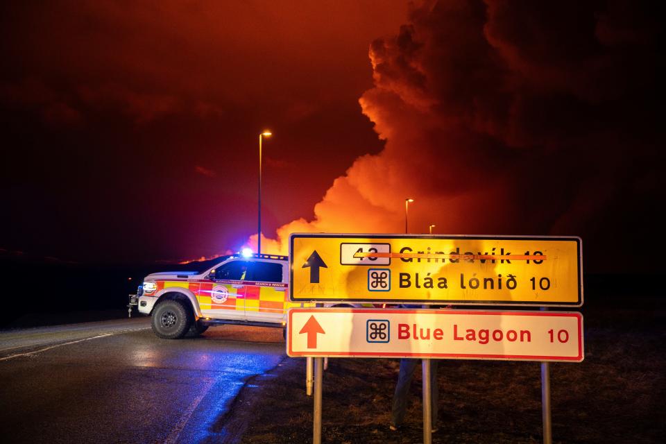 An emergency vehicle is stationed on a road leading to volcanic activity between Hagafell and Stóri-Skógfell, Iceland, on Saturday, March 16, 2024.