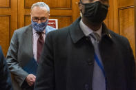 Senate Majority Leader Chuck Schumer of N.Y, takes the elevator in the U.S. Capitol, Friday, Jan. 22, 2021, in Washington. It's taken only days for Democrats gauging how far President Joe Biden's bold immigration proposal can go in Congress to acknowledge that if anything emerges, it will likely be significantly more modest. (AP Photo/Manuel Balce Ceneta)