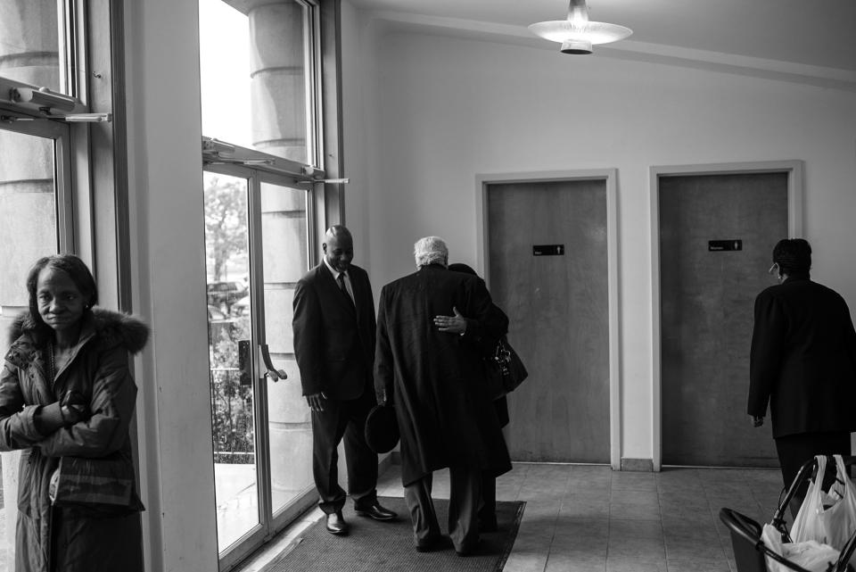 <p>Spencer Leak Sr hugs a woman at a funeral he helped organize at South Park Baptist Church on Chicago’s south side. (Photo: Jon Lowenstein/NOOR for Yahoo News) </p>