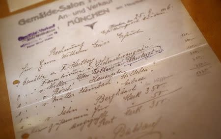 The original bill of sale for a watercolour of the old registry office in Munich by former German dictator Adolf Hitler is displayed at Weidler auction house in Nuremberg November 18, 2014. REUTERS/Kai Pfaffenbach